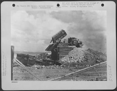 Garbage Barge Which Disposes Of Rubbish At Sea, Saipan, Marianas Islands. (U.S. Air Force Number B64130AC)