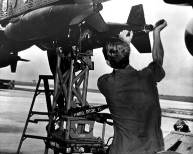 Bombs are loaded aboard a B-52 Stratofortress aircraft from Strategic Air Command as Arc Light, part of Operation Linebacker, gets underway