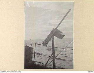 MIOS WUNDI HARBOUR, DUTCH NEW GUINEA. 1944-11-15. A .50 INCH CALIBRE MACHINE GUN MOUNTED AFT ON HMAS STAWELL