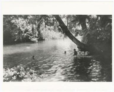 [Marine Corps servicemen at swimming hole]