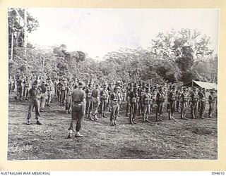 LAMARIEN, HENRY REID BAY, NEW BRITAIN, 1945-07-28. TROOPS OF 2/2 COMMANDO SQUADRON ON PARADE AT THEIR HEADQUARTERS