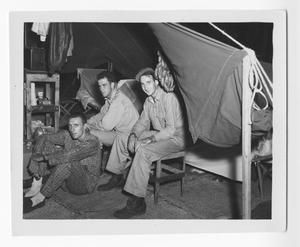 [Three Servicemen in Tent on Guadalcanal]