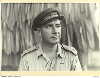 PORT MORESBY, PAPUA, NEW GUINEA, 1 APRIL 1944. INFORMAL PORTRAIT OF SX22297 CAPTAIN D. R. DOWNEY, GSO III, (LIAISON), INTELLIGENCE, HEADQUARTERS NEW GUINEA FORCE