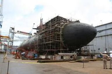 (NYT28) APRA HARBOR, Guam -- May 17, 2005 -- SUBMARINE-CRASH-1 -- The USS San Francisco in dry dock on May 13, 2005, undergoing repair following a collision with an undersea mountain not on its navigational charts. One crewman was killed, 97 others were i