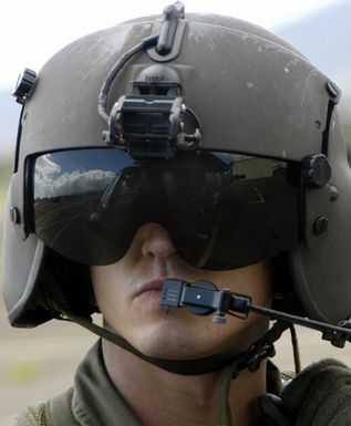 US Army (USA) SPECIALIST Fourth Class (SPC) Eric D. Gould, crewchief, UH-60 Black Hawk (Blackhawk) helicopter, performs a pre-flight check before winch/hoist training at Wheeler Army Airfield (AAF), Hawaii (HI). Soldiers from the 68th Medical Company (Air Ambulance) (MED CO (AA)), 25th Infantry Division (ID) (Light), are helping guide members of JPAC (Joint POW/MIA Accounting Command) through hoist training and familiarization before their next recovery mission to Laos. The JPAC mission is to achieve the fullest possible accounting of all Americans missing as a result of our nation's previous conflicts