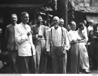 Ramale Valley, New Britain. Informal group portrait of some of the inmates at the Ramale Valley Internment Camp. Contact with the camp was made by Allied troops and representatives of the ..