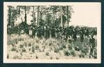 Crowd of New Guinean men at opening of the first dredge at the Bulolo Gold Dredging mine, Bulolo, New Guinea, 21 Mar 1932