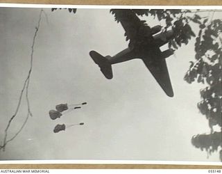 NEW GUINEA, 1943-08-01. "KAI" OR "BISCUIT" BOMBERS WERE USED TO CARRY SUPPLIES OF FOOD AND AMMUNITION TO FORWARD TROOPS IN INACCESSIBLE AREAS. NOTE - KAI IS THE NATIVE WORD FOR FOOD. PHOTOGRAPH ..
