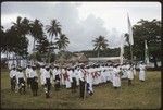 Christian Felowship Church members with flags and music