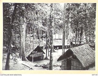 KURURIA YAMA, RABAUL, NEW BRITAIN. 1945-09-24. A VIEW OF THE INDIAN PRISONER OF WAR CAMP