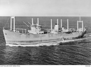 1941-07-28. AERIAL PORT BOW VIEW OF THE NORWEGIAN CARGO VESSEL SKAGERAK WHICH HELPED EVACUATE EUROPEAN NATIONALS FROM NAURU ON 1941-07-17. (NAVAL HISTORICAL COLLECTION)
