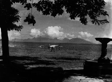 [Coastal landscape with a covered mounted gun]