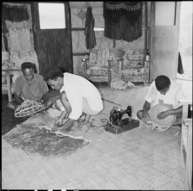 Three Fijian men handcrafting souvenirs, Fiji, November 1969 / Michael Terry