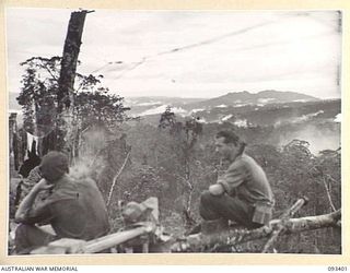 BERRY'S HILL, CENTRAL BOUGAINVILLE. 1945-06-27. GUNNER R.P. HARDINGHAM, 2 MOUNTAIN BATTERY, BESIDE THE NUMA NUMA TRAIL ON THE EAST SIDE OF BOUGAINVILLE