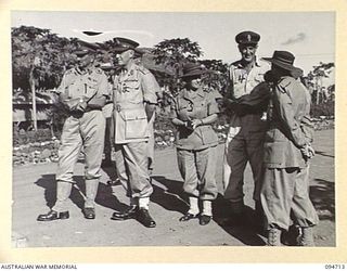 LAE AREA, NEW GUINEA, 1945-08-04. LIEUTENANT-GENERAL B.M. MORRIS, GENERAL OFFICER COMMANDING AUSTRALIAN NEW GUINEA ADMINISTRATIVE UNIT (1) AND MAJOR-GENERAL V.A.H. STURDEE, GENERAL OFFICER ..