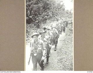 1943-09-22. NEW GUINEA. AUSTRALIAN TROOPS CAPTURE LAE. AUSTRALIAN TROOPS ENTER LAE