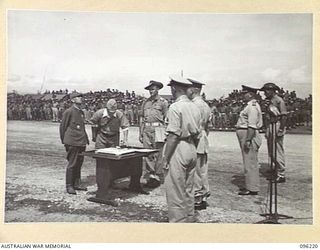 CAPE WOM, NEW GUINEA, 13 SEPTEMBER 1945. LIEUTENANT GENERAL ADACHI, COMMANDER 18 JAPANESE ARMY IN NEW GUINEA, FORMALLY SURRENDERED TO MAJOR-GENERAL H.C.H. ROBERTSON, GENERAL OFFICER COMMANDING 6 ..