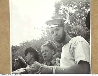 ELA BEACH, NEW GUINEA. 1943-11-13. CODER C. W. BROOK (1) AND CODER J. HILL (2), MEMBERS OF THE ROYAL AUSTRALIAN NAVY FROM PORT MORESBY AT THE COMBINED SERVICES SPORTS MEETING