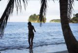 Samoa, woman walking on beach