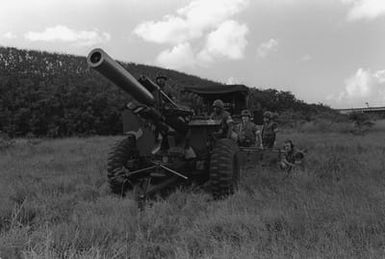 Marines from Kilo Battery, 1ST Battalion, 12th Marines, prepare to provide supporting arms fire with an M-114 155mm howitzer during Operation Kernel Blitz