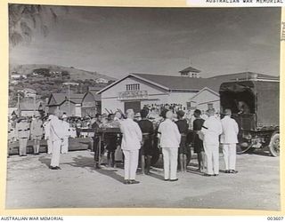 PORT MORESBY - SIR HUBERT MURRAY'S COFFIN ON AIR FORCE TRAILER. (NEGATIVE BY N. TRACY)