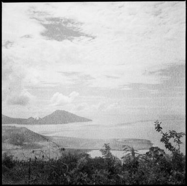 Vegetation with the sea and South Daughter Mountain in the distance, Rabaul Harbour, New Guinea, 1937 / Sarah Chinnery