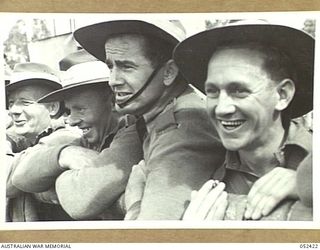 HERBERTON, QLD. 1943-06-12. THESE TROOPS WERE ON "MITTENS" A 3 TO 1 WINNER AT THE 6TH AUSTRALIAN DIVISION RACE MEETING