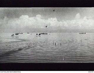 GUADALCANAL, BRITISH SOLOMON ISLANDS PROTECTORATE. 1942-08-08. MITSUBISHI G4M (BETTY) TORPEDO BOMBERS OF THE JAPANESE NAVAL AIR FORCE COME IN VERY LOW THROUGH HEAVY ANTI AIRCRAFT FIRE TO ATTACK US ..