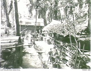 THE SOLOMON ISLANDS, 1945-10-13. GENERAL VIEW OF QUARTERS AT AN INTERNMENT CAMP FOR JAPANESE NAVAL PERSONNEL. (RNZAF OFFICIAL PHOTOGRAPH.)