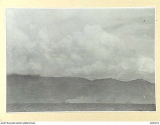 MILNE BAY, NEW GUINEA. 1943-01. JAPANESE AIRCRAFT ATTACKING ALLIED SHIPPING IN THE BAY