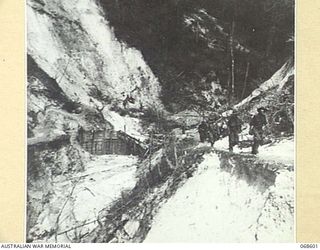 NEW GUINEA. 1943. BADLY ERODED AREAS ALONG THE TRACK ON THE APPROACH TO SATTELBERG