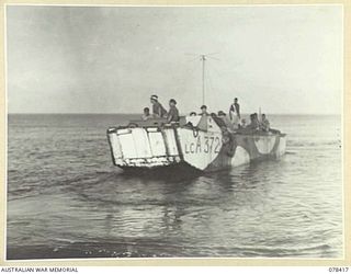 MOTUPINA POINT, BOUGAINVILLE ISLAND. 1945-01-19. THE HEAVILY ARMOURED LANDING BARGE OF THE 2ND AUSTRALIAN FIELD REGIMENT, ROYAL AUSTRALIAN ARTILLERY WHICH THE UNIT USES AS A MOBILE OBSERVATION POST