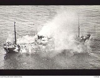 WEWAK, NEW GUINEA. 1944-03-19. THE JAPANESE SHIP "TADJI" IN THE AITAPE AREA. SHOWING THE SMOKE AND SPRAY FROM A BOSTON BOMBER AIRCRAFT ATTACK
