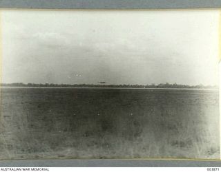 CENTRAL AUSTRALIA - GUINEA AIRWAYS LOCKHEED LEAVING DALY WATERS AERODROME FOR DARWIN. ARMY. ALICE SPRINGS TO BIRDUM. (NEGATIVE BY R.G.P.)