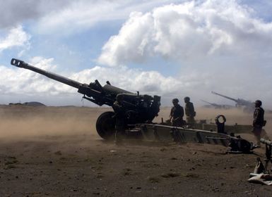 1ST Battalion, 12th Marines, Charlie Company, fires an M198 Howitzer during a training exercise at Pohakuloa Training Area on the Big Island of Hawaii