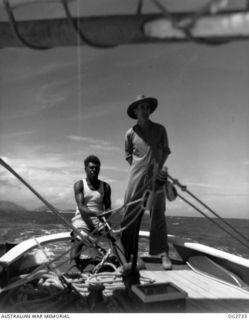 PORT MORESBY, PAPUA. C. 1944. MEMBERS OF THE CREW OF A SAILING VESSEL USED BY THE RAAF RESCUE SERVICE