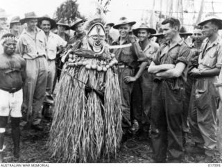 New Guinea. 11 January 1944. A New Guinea native in a ceremonial dance which celebrates liberation and offers a prayer for the forthcoming harvest