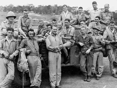 Pilots of the RNZAF 14th squadron at smoko during the Battle of Bougainville, North Solomon Islands, during World War II