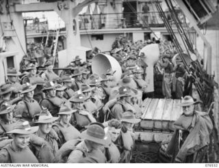 MILFORD HAVEN, LAE, NEW GUINEA. 1944-10-06.TROOPS OF THE 36TH INFANTRY BATTALION AT THEIR BOAT DRILL STATIONS ABOARD THE DUTCH TROOPSHIP "SWARTENHONDT" WHILE ENROUTE FROM NEW GUINEA TO NEW BRITAIN. ..