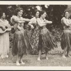 Hula dancers and musicians