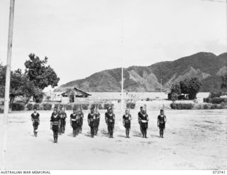 SALAMAUA, NEW GUINEA. 1944-06-04. MEMBERS OF THE ROYAL PAPUAN CONSTABULARY ON PARADE AT HEADQUARTERS AUSTRALIAN NEW GUINEA ADMINISTRATIVE UNIT, IN THE MOROBE DISTRICT