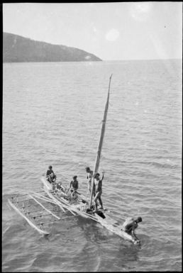 Outrigger canoe with a tall mast, Port Moresby, Papua, ca. 1923 / Sarah Chinnery