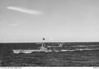 PACIFIC OCEAN. C.1945. AMERICAN SUBMARINES RETURNING FROM A PATROL. THEY ARE USS FLYING FISH, USS SPADEFISH, USS TENOSA, USS BOWFIN AND USS SKATE. (NAVAL HISTORICAL COLLECTION)