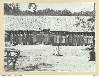 EGGY'S CORNER, PORT MORESBY, PAPUA, 1944-02-20. VFX361 COLONEL A.M. SAGE, RRC, MATRON-IN-CHIEF, AUSTRALIAN ARMY NURSING SERVICE, PICTURED IN FRONT OF THE SISTERS' MESS AT THE 2/1ST GENERAL HOSPITAL ..