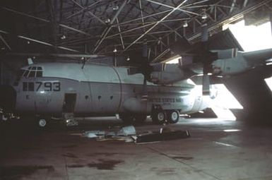 Hangers that housed ground equipment and a C-130 received heavy damage during Hurricane Omar. These hangers belong to VRC-50, a U.S. Navy squadron based at Anderson AFB, Guam