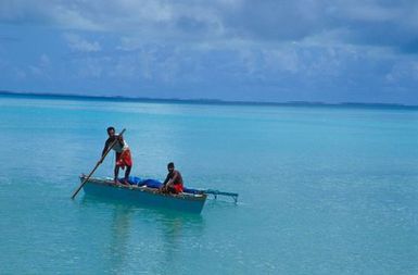 Canoes sailing