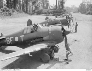 BOUGAINVILLE ISLAND, SOLOMON ISLANDS. 1945-01-12. LINE UP OF BOOMERANG AIRCRAFT, SERIAL NO. A46-214, CODED BF-T AND BF-K, OF NO. 5 (ARMY CO-OPERATION) SQUADRON RAAF AT PIVA AIRFIELD, TOROKINA. ..