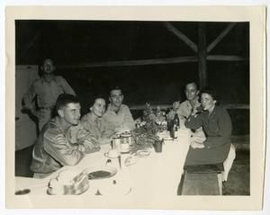 [Three Servicemen and Two Flight Nurses at Table During Anniversary Party]