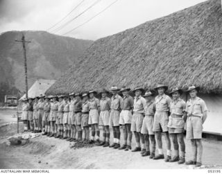 The Seventeen Mile, Port Moresby, New Guinea. Administrative staff of the 2/9th Australian General Hospital in front of the administration building. Identified left to right are: QX17862 Staff ..