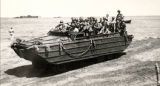 Company K, 164th Infantry, soldiers in amphibious army vehicle on Guadalcanal
